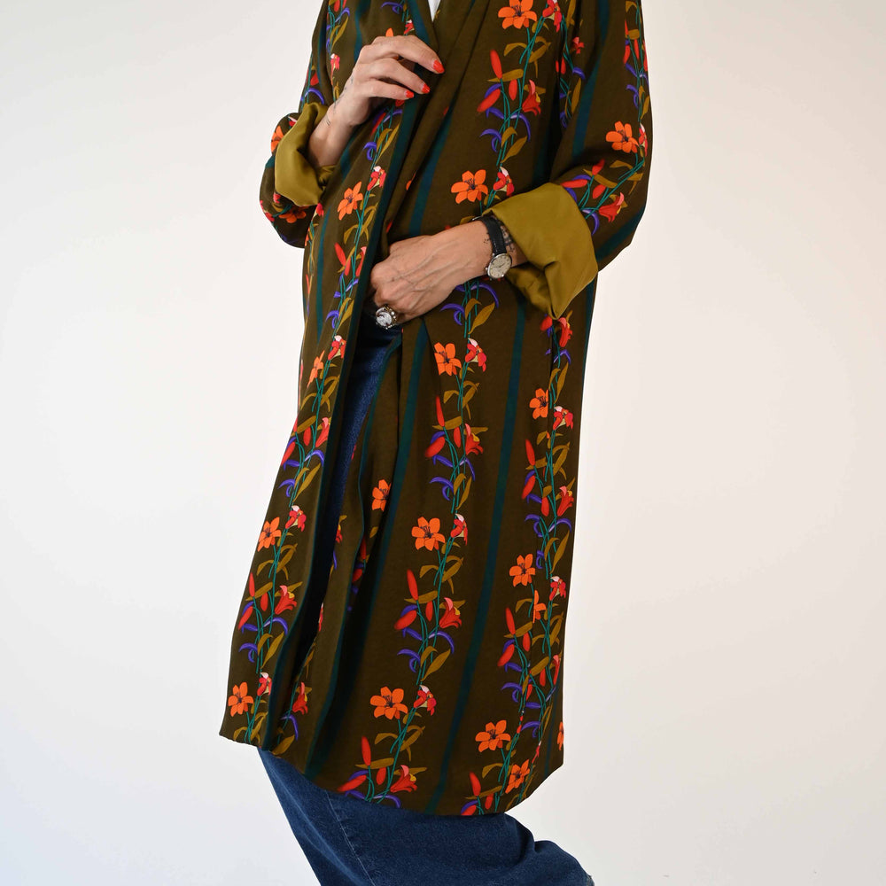 
                  
                    KIMONO IN VISCOSA FANTASIE FLOREALE MARRONE/ARANCIO
                  
                