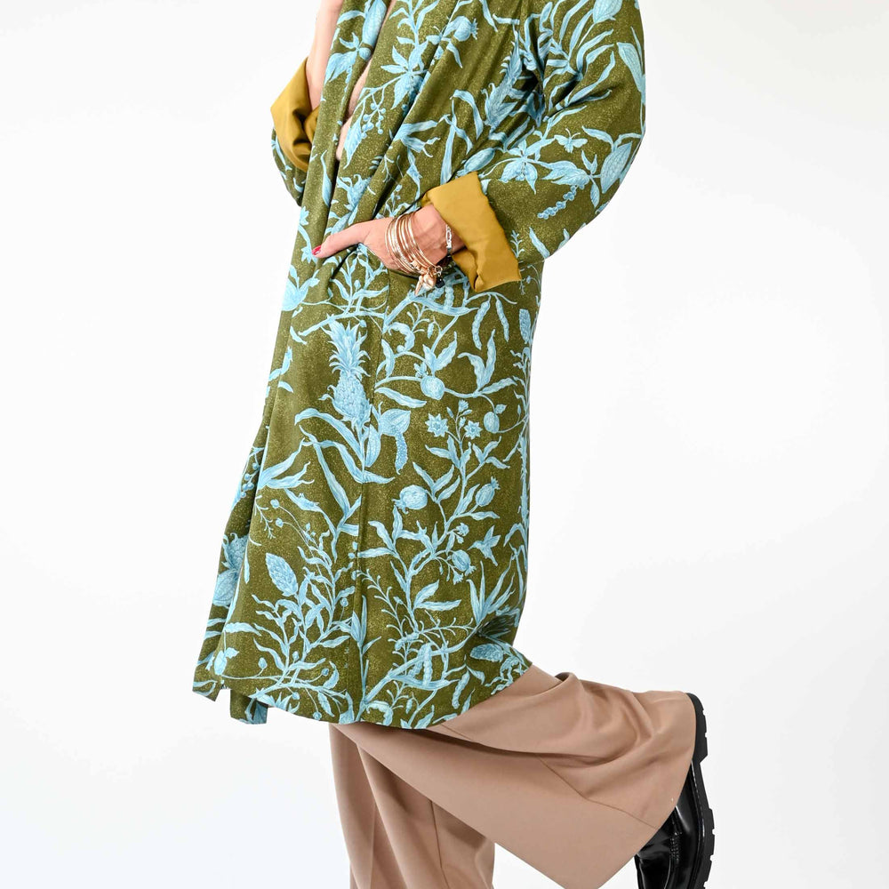 
                      
                        KIMONO FANTASIA FLOREALE COLOR VERDE/CELESTE
                      
                    