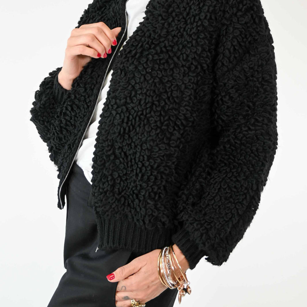 
                      
                        BOMBER OVER IN LANA BOUCLE' COLOR NERO
                      
                    