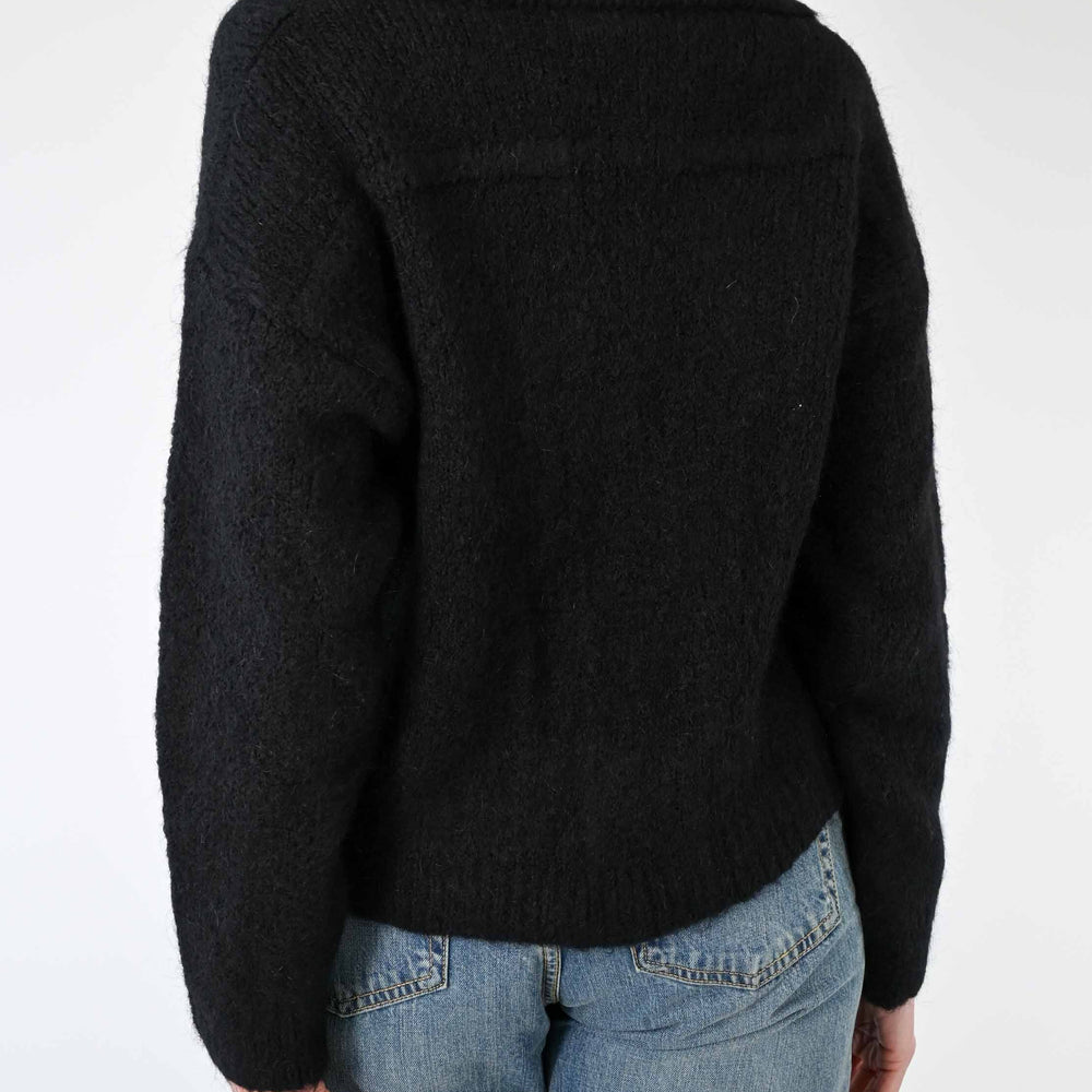 
                  
                    MAGLIA A POLO CON CABOCHON MOHAIR NERO
                  
                