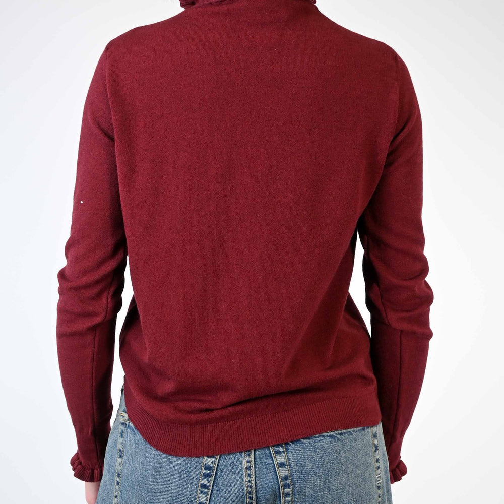 
                  
                    MAGLIA LUPETTO CON ROUGES COLOR BORDEAUX
                  
                