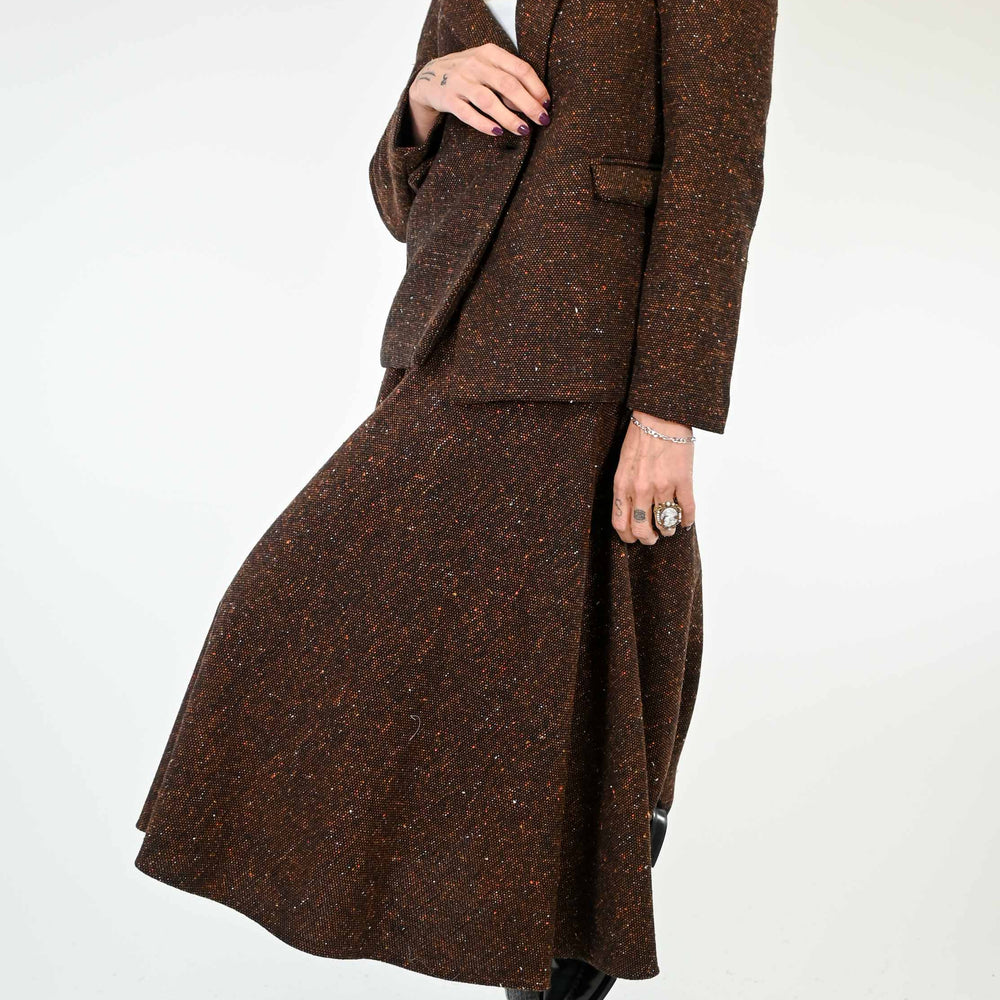 
                  
                    GIACCA CON SPALLA A SBUFFO IN TWEED COLOR RUGGINE
                  
                