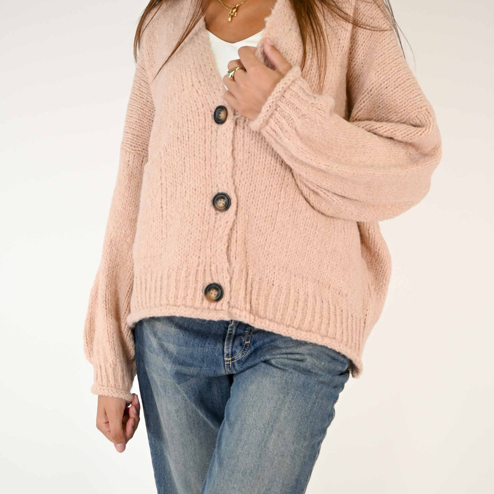 
                      
                        CARDIGAN OVER CON MANICA A PALLONCINO COLOR ROSA
                      
                    