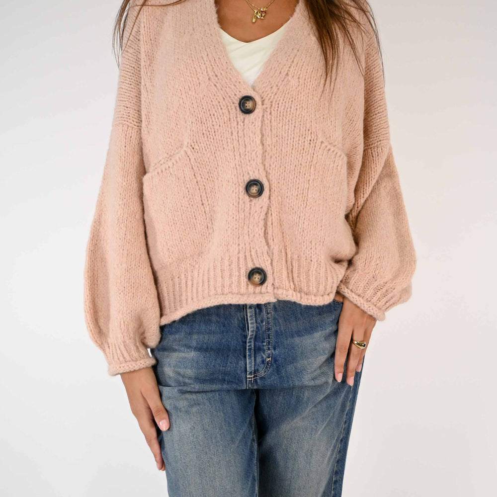 
                      
                        CARDIGAN OVER CON MANICA A PALLONCINO COLOR ROSA
                      
                    