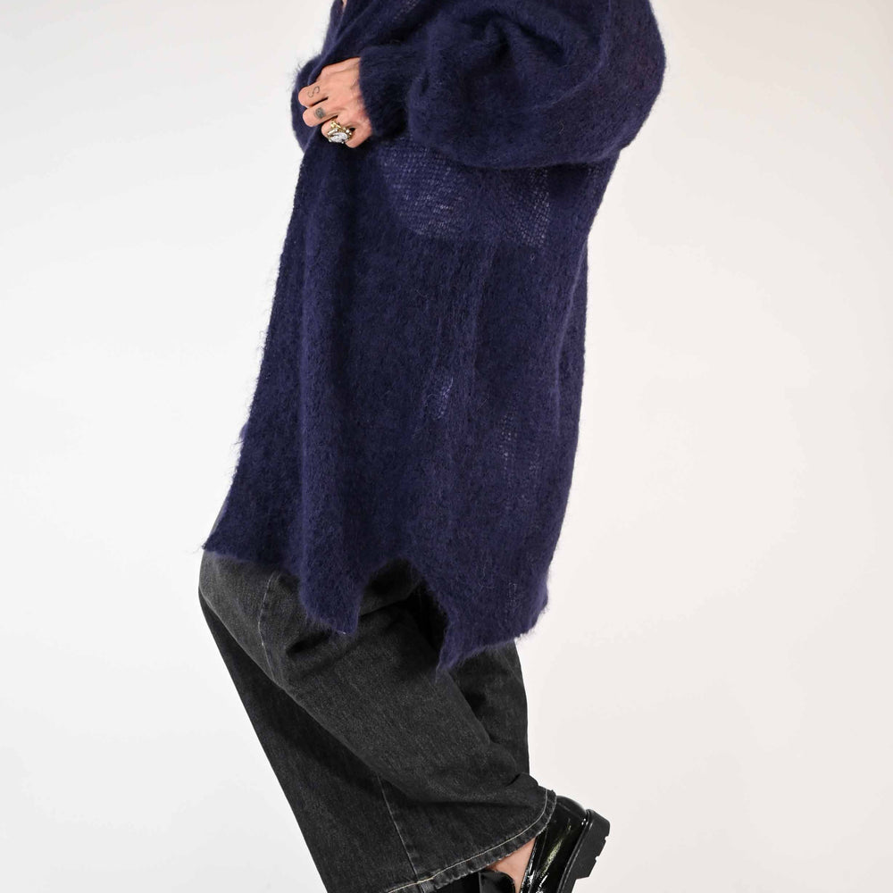 
                  
                    CARDIGAN IN MOHAIR CON SPACCHI COLORE VIOLA
                  
                