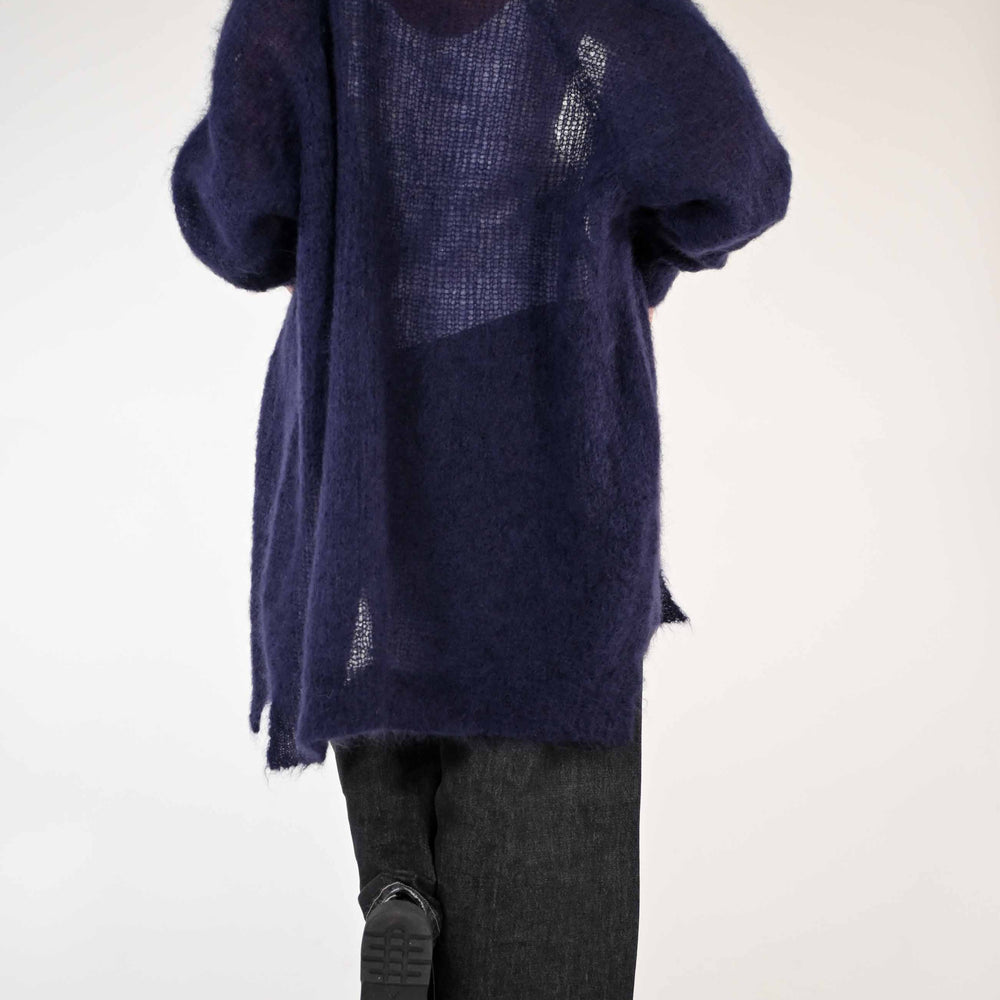 
                  
                    CARDIGAN IN MOHAIR CON SPACCHI COLORE VIOLA
                  
                