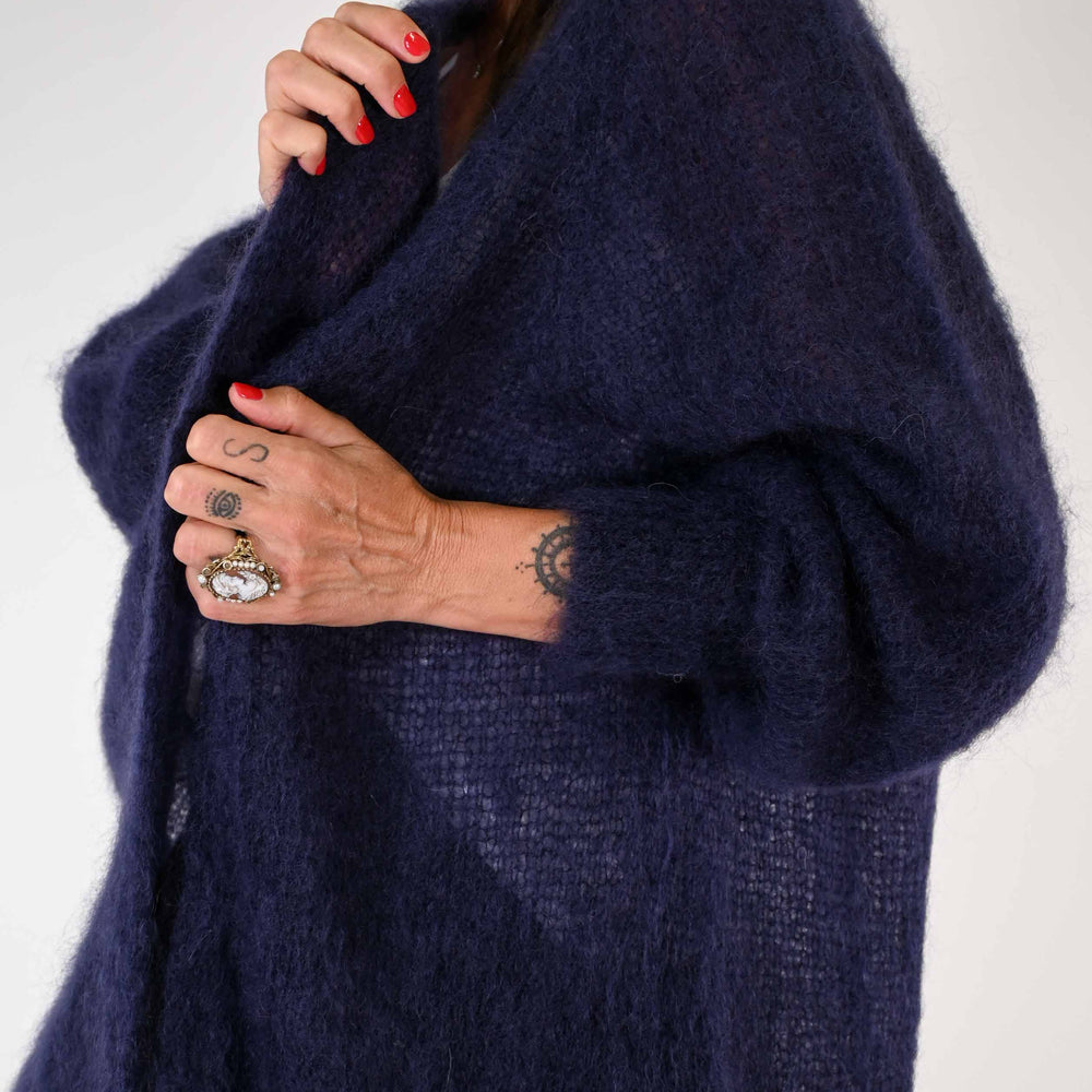 
                  
                    CARDIGAN IN MOHAIR CON SPACCHI COLORE VIOLA
                  
                