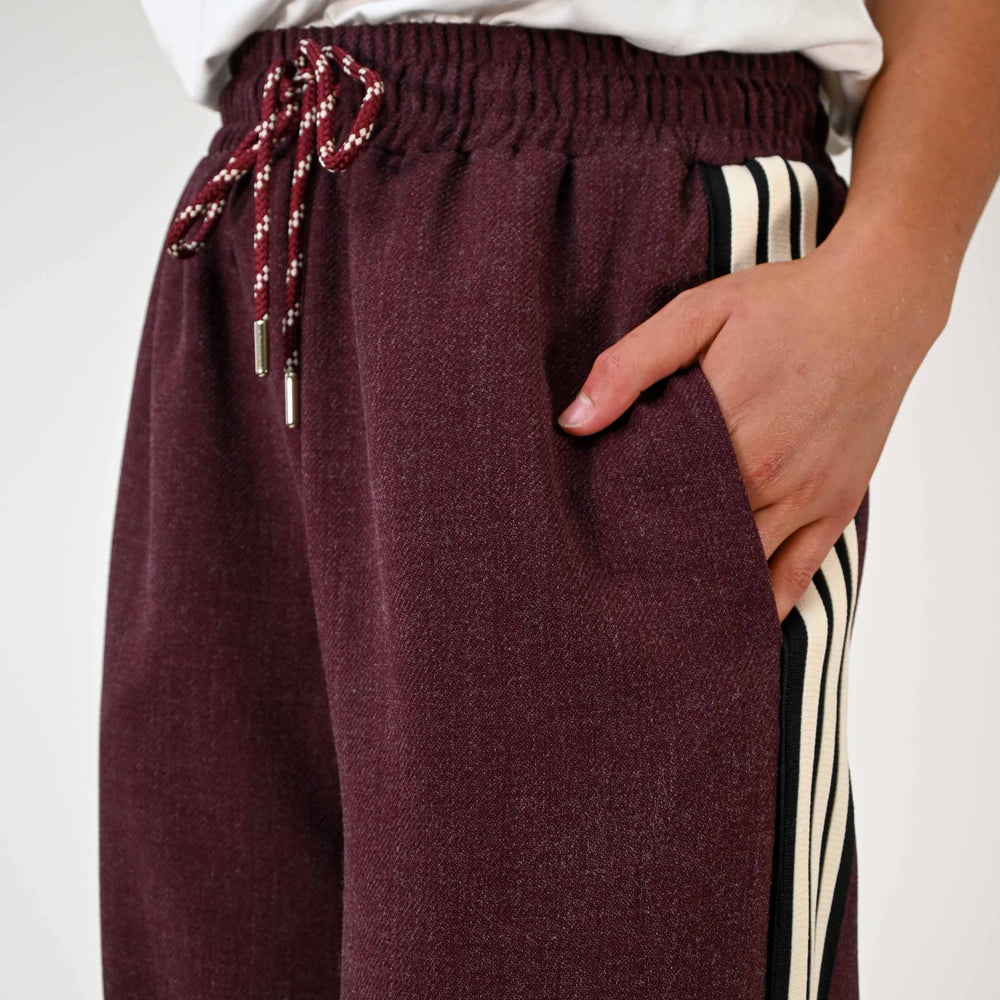 
                  
                    PANTALONE BORDEAUX PALAZZO CON COULISSE E BANDA
                  
                