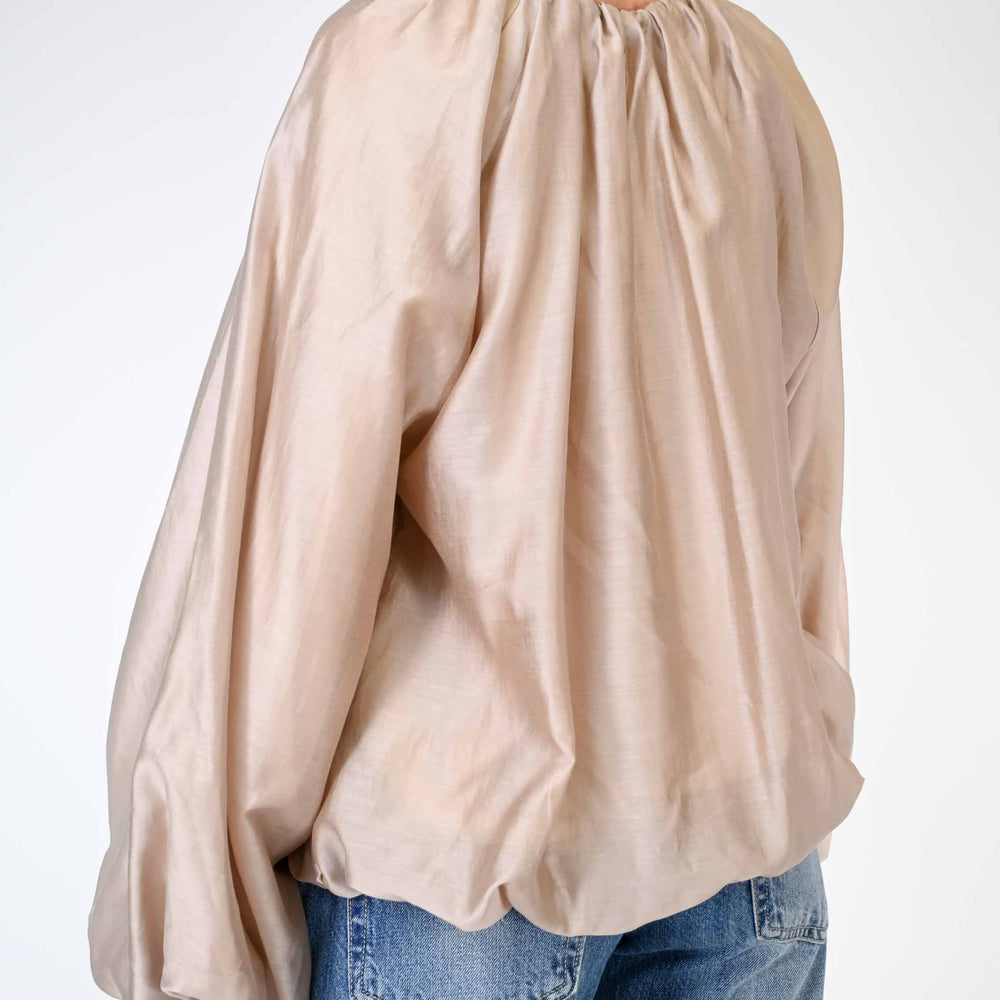 
                  
                    CAMICIA OVER IN TENCELL CON ARRICCIATURE BEIGE
                  
                